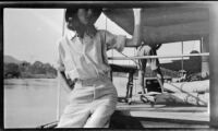 Margaret Rotha aboard the tugboat S.S. Livingston on Lake Albert during a journey to Murchison Falls, Uganda, 1933