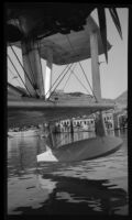 Seaplane pontoon and wings during the filming of Contact, [Karachi?], 1932