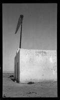 Building with windsock during the filming of Contact, [Karachi airport?], 1932