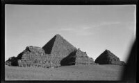 View of the Great Pyramid with three small pyramids taken during the filming of Contact, Jīzah, Egypt, 1932