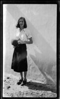 Margaret Rotha standing near wall, Karachi or Gwadar, 1932