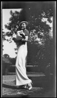 Woman in long skirt, [London?], 1932-1933