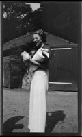 Woman in long skirt, [London?], 1932-1933