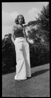 Margaret Rotha in scarf and trousers, [London?], 1932-1933