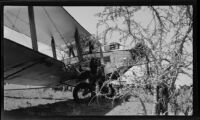 Transport plane next to thorn bushes after a forced landing, Kigwe, Tanzania, 1932
