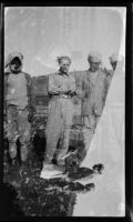Filmmaker Paul Rotha with three local men, Tiberias (vicinity), 1932