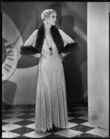 Peggy Peggy Hamilton modeling a long lace dress from Jean Swartz's Fashion Salons, 1930