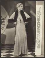 Peggy Hamilton modeling a long lace dress from Jean Swartz's Fashion Salons, 1930
