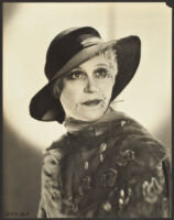 Peggy Hamilton modeling a Hortense hat made from baku, 1932
