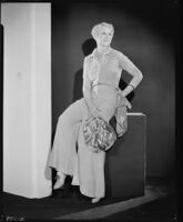 Peggy Hamilton modeling blue and white crochet beach pajamas, 1931