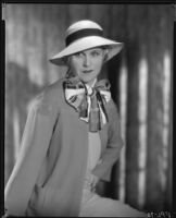 Peggy Hamilton modeling a straw hat and jacket, 1933