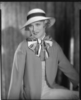 Peggy Hamilton modeling a straw hat and jacket, 1933