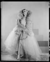 Peggy Hamilton modeling an Adrian  tulle evening gown, 1929