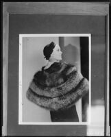 Peggy Hamilton modeling a fur stole and hat, 1931