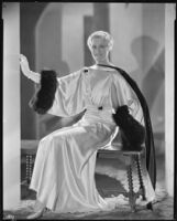 Peggy Hamilton modeling a Max Rée gown in ivory and black satin, 1931