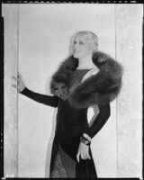 Peggy Hamilton modeling an Earl Luck velvet coat and blue sequin dinner gown, 1931