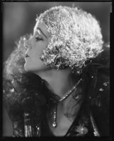Peggy Hamilton modeling a metallic wig, circa 1925