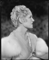 Peggy Hamilton modeling a formal coiffure hairstyle by Weaver Jackson's Salon, 1933