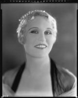 Peggy Hamilton wearing a crown and a sheer wrap, circa 1929-1931