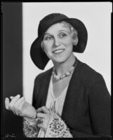 Peggy Hamilton modeling a Hortense hat with a wide brim, 1931