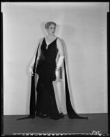 Peggy Hamilton modeling a formal evening gown, 1930