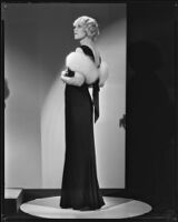 Peggy Hamilton modeling a black velvet dinner gown, 1933