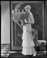 Peggy Hamilton modeling a chiffon evening gown, 1931