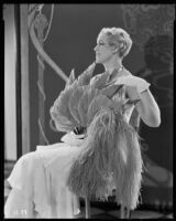 Peggy Hamilton modeling a chiffon evening gown, 1931