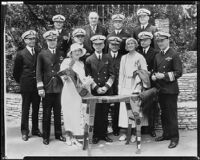 Peggy Hamilton, Clara Schofield, Burr McIntosh and ten Navy admirals at the Breakfast Club, Los Angeles, 1932