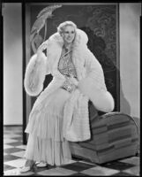 Peggy Hamilton modeling an ermine coat, 1931