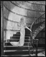 Peggy Hamilton modeling a Max Rée gown as 