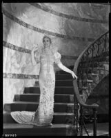 Peggy Hamilton modeling a Max Rée gown as "Queen Olympia," 1931