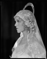 Peggy Hamilton modeling an Earl Luck wedding veil, 1931