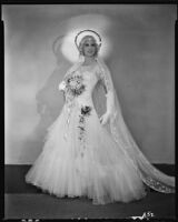 Peggy Hamilton modeling an Earl Luck wedding dress, 1931