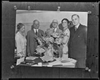 Peggy Hamilton with 4 others, holding a basket of flowers on a special occasion, circa 1930-1933