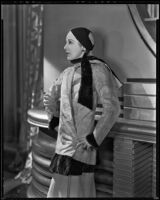 Actress (?) modeling a fur coat, circa 1931-1933