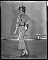 Actress Loretta Young modeling a knit dress, 1932