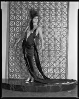 Peggy Hamilton modeling a Max Rée gown worn by actress Maria Corda in the movie Love and the Devil, 1929