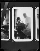 Dr. Leonard Siever, a dentist, with a patient at his dental office, Pasadena, 1917-1933