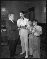 Los Angeles Mayor Frank Shaw, two young harmonica players, and harmonica teacher Kenneth Milton, Los Angeles, 1935