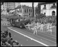 Unidentified garden float with 11 winged outwalkers in the Tournament of Roses Parade, Pasadena, 1927