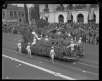 Float with trumpeters and floral eagle in the Tournament of Roses Parade, Pasadena, 1928