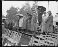 Spectators in a grandstand at the Tournament Roses Parade, Pasadena, 1934