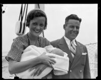 Mary Astor and her husband Dr. Franklyn Thorpe arrive with baby Marylyn, Los Angeles, 1932