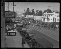 Stunt driver Hayward Thompson drives blindfolded through Los Angeles, 1927