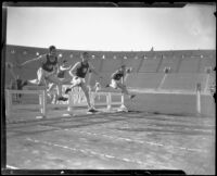 Mort Kaer, Kenny Grumbles, and Leighton Dye finish the hurdle race, Los Angeles, 1926