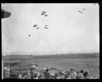 U.S. Army biplanes perform maneuvers during air show at United Airport, Burbank, 1930