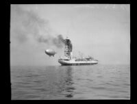 Goodyear-Zeppelin airship approaching the USS Patoka in the Port of Los Angeles, San Pedro, 1932