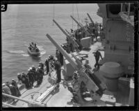 Sailors aboard the USS West Virginia await the arrival of a launch boat, Southern California, 1924-1939