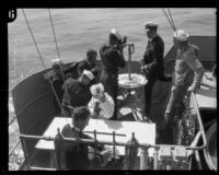 Officers and sailors man the range finder station aboard the USS West Virginia, 1924-1939
